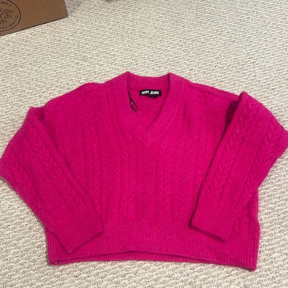 - DKNY sweater